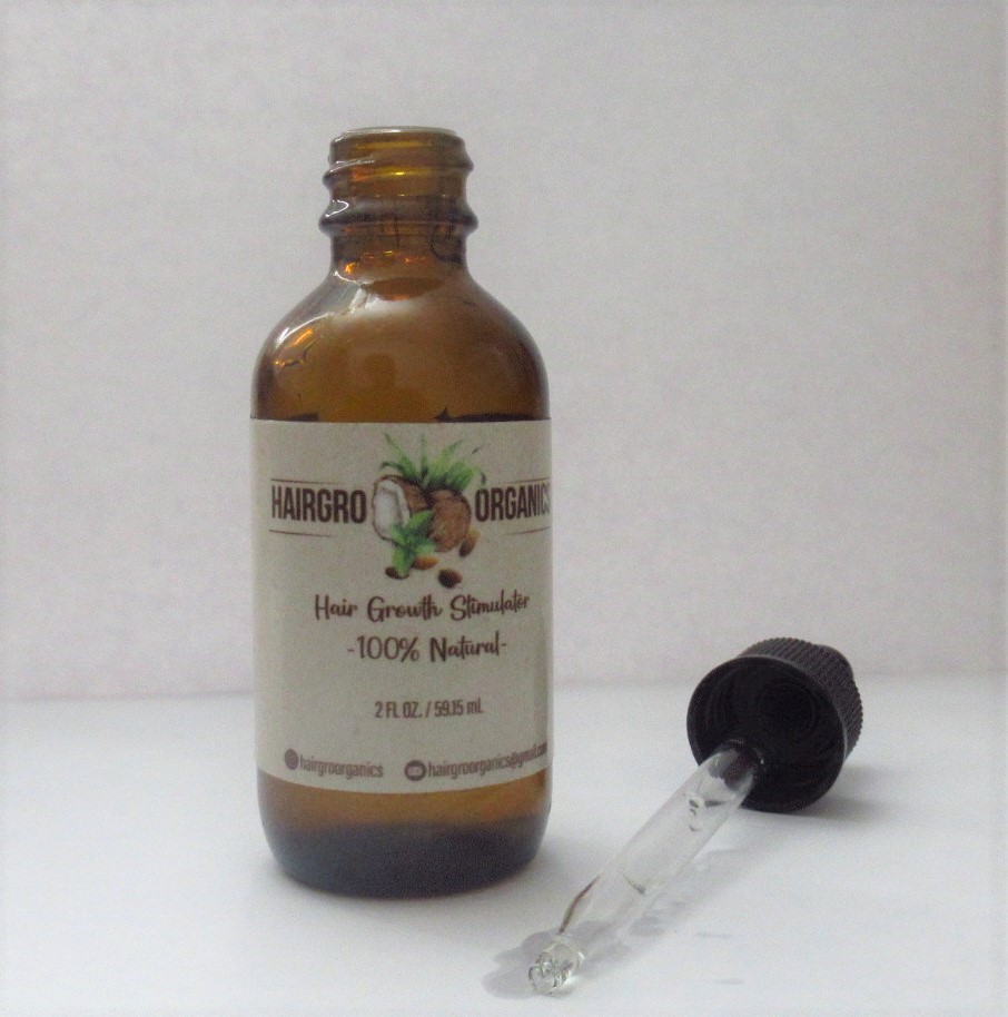 Hair Growth Stimulator Bottle with open lid